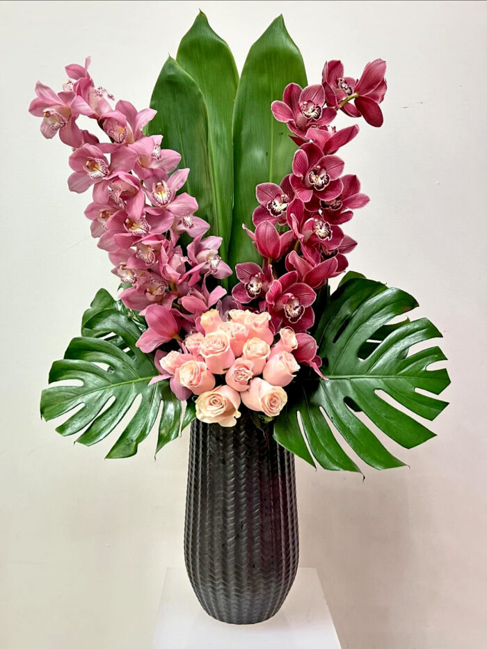 Sandra Pink and Purple Orchids and Roses.jpg