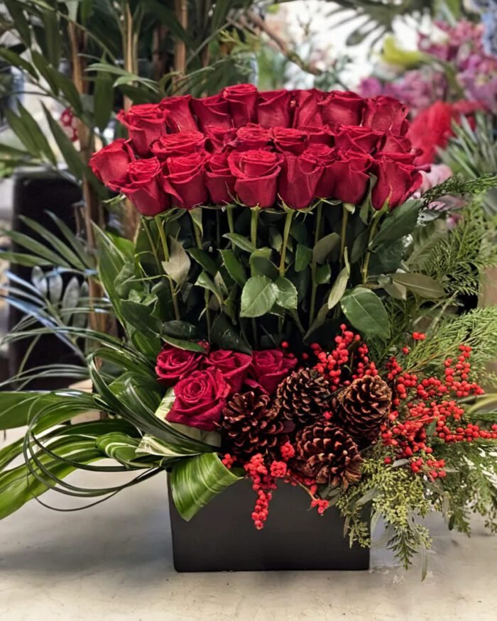 Sprinkle Sparkle Christmas flower arrangement of red roses